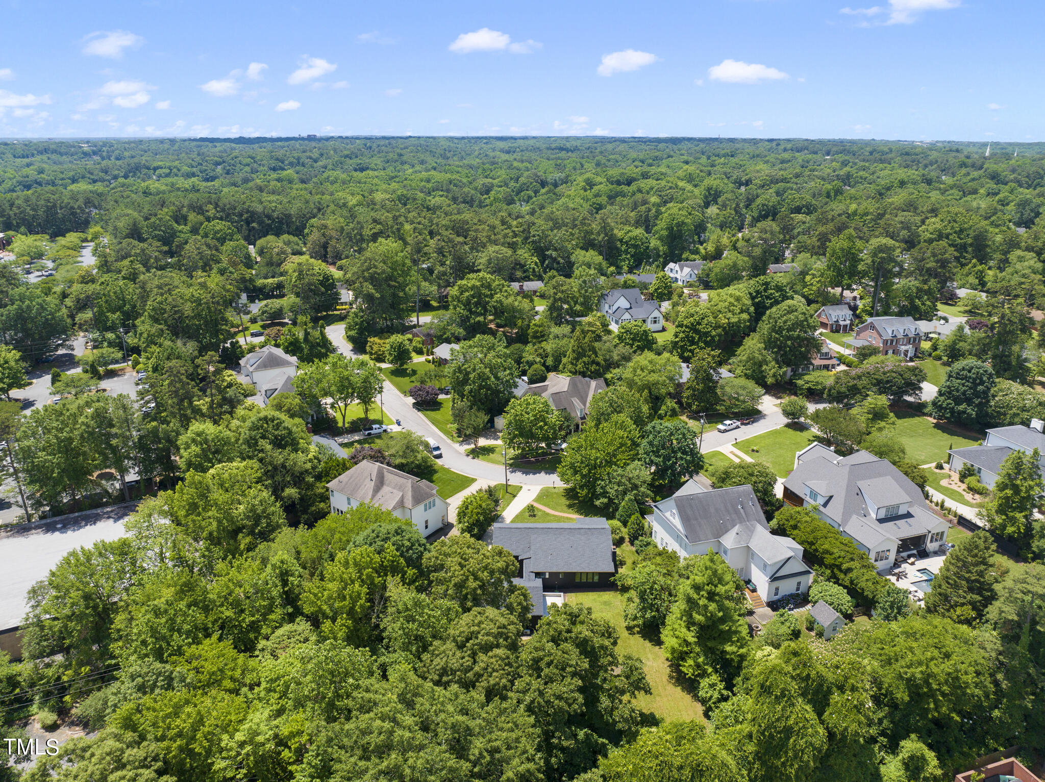 3122 Ashel Street Raleigh, NC 27612 - Photo 36 of 39 an aerial view of residential houses with outdoor space and trees