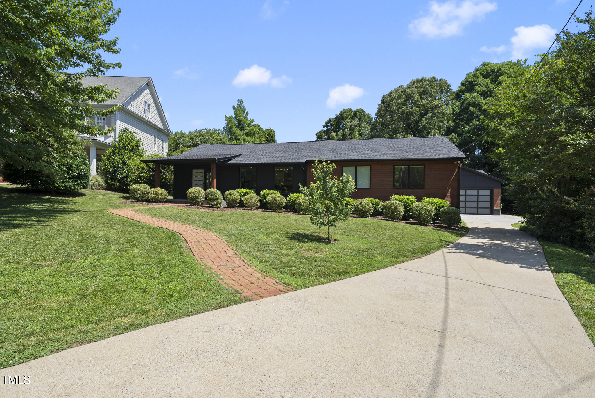 3122 Ashel Street Raleigh, NC 27612 - Photo 39 of 39 a front view of a house with a yard