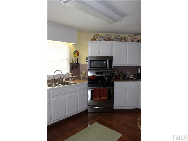 1035 Anglers Way Roxboro, NC 27574 - Photo 12 of 25 Charming and cheerful Kitchen!