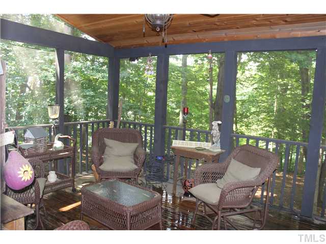 1035 Anglers Way Roxboro, NC 27574 - Photo 22 of 25 Inviting Screened in Porch on lakeside of home with beautiful views all around!