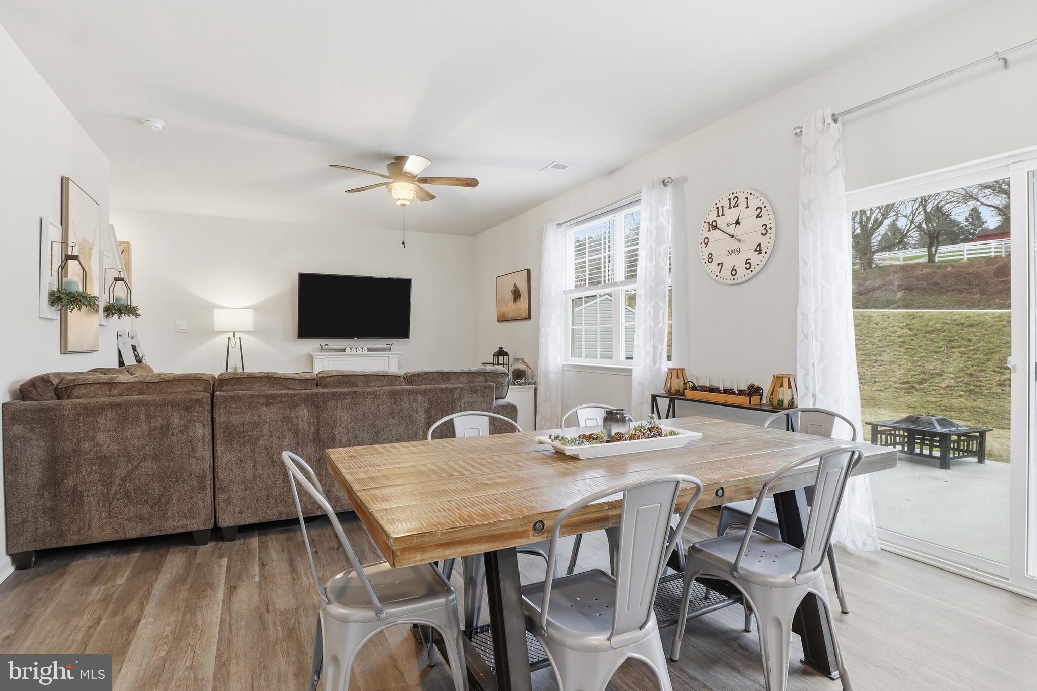 4301 Brent Drive Spring Grove, PA 17362 - Photo 14 of 49 a view of a dining room with furniture window and wooden floor