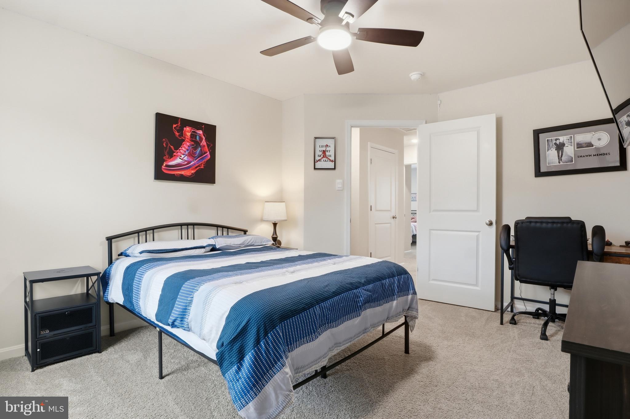 4301 Brent Drive Spring Grove, PA 17362 - Photo 24 of 49 a bedroom with a bed and a desk