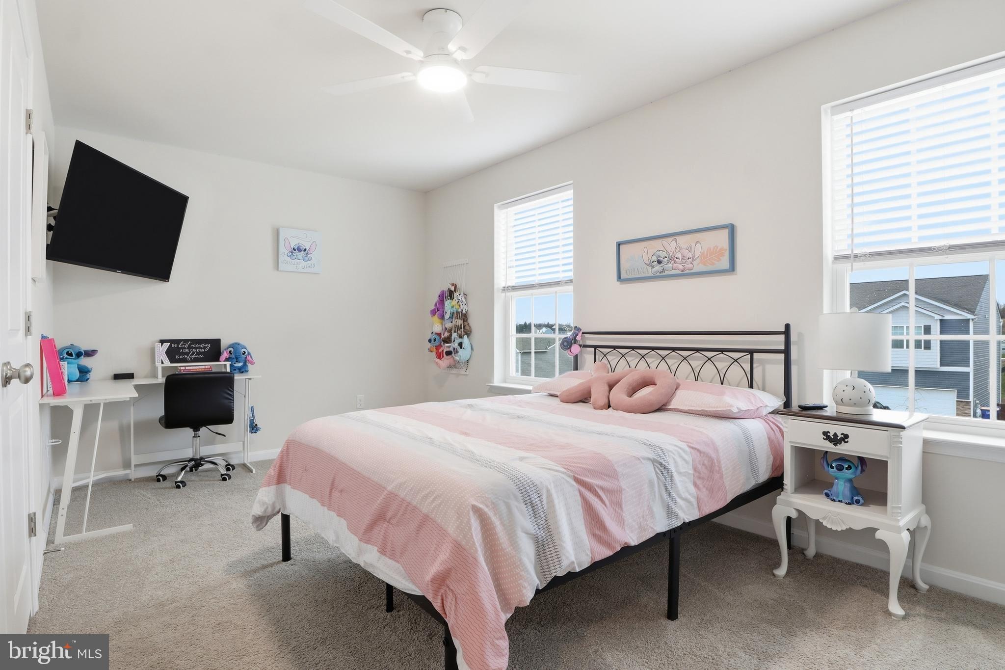 4301 Brent Drive Spring Grove, PA 17362 - Photo 28 of 49 a bedroom with a bed and a flat screen tv