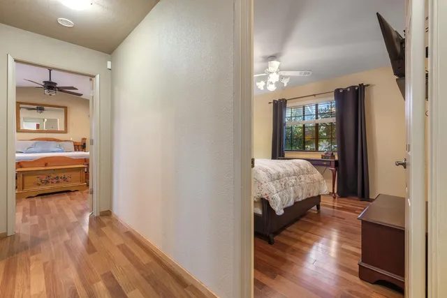 a bathroom with a granite countertop sink mirror and