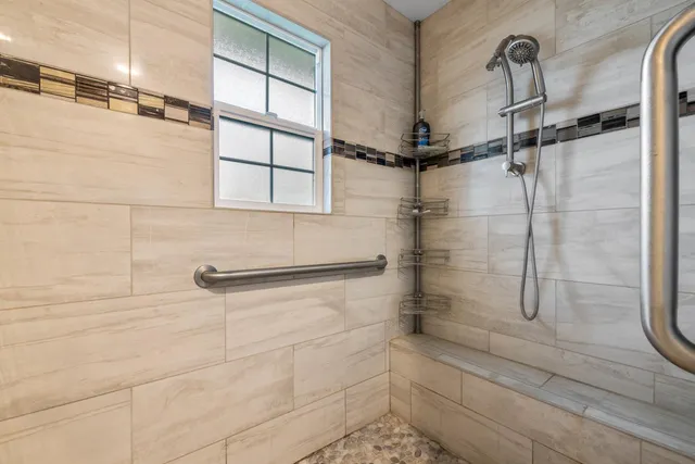 a view of a swimming pool with a patio