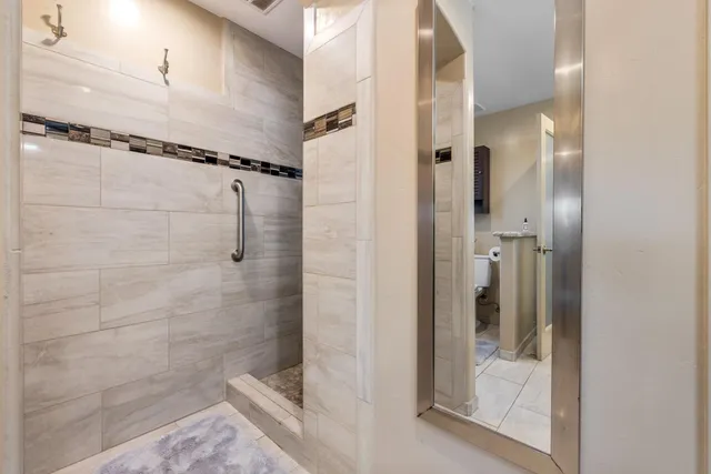 a view of a swimming pool with a patio