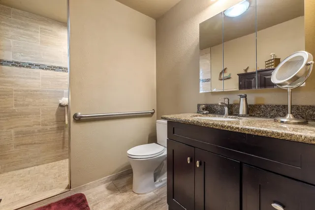 a view of a workspace with furniture