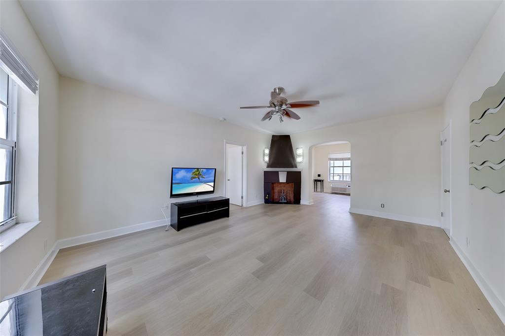 1241 13th Street, Unit 2 Miami Beach, FL 33139 - Photo 1 of 20 a living room with furniture and a ceiling fan