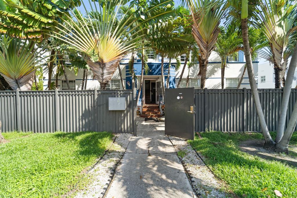 1241 13th Street, Unit 2 Miami Beach, FL 33139 - Photo 11 of 20 a front view of a house with a garden