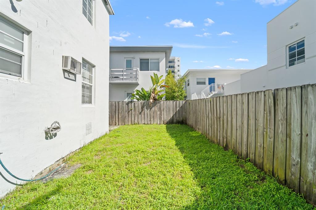 1241 13th Street, Unit 2 Miami Beach, FL 33139 - Photo 16 of 20 a view of a backyard of the house