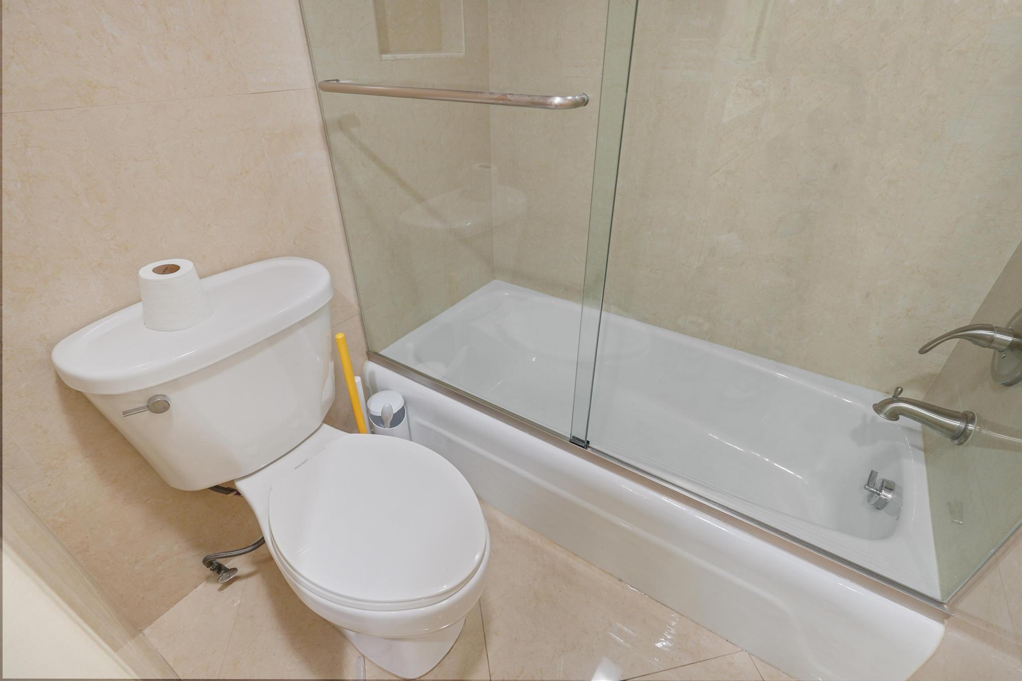 859 Jeffery Street, Unit 506 Boca Raton, FL 33487 - Photo 30 of 80 a bathroom with a toilet and a shower