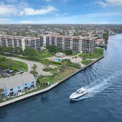 859 Jeffery Street, Unit 506 Boca Raton, FL 33487 - Photo 49 of 80 a view of a lake with a big yard