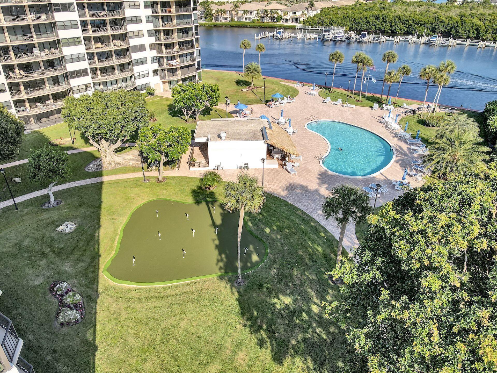 859 Jeffery Street, Unit 506 Boca Raton, FL 33487 - Photo 54 of 80 an aerial view of residential houses with outdoor space and swimming pool