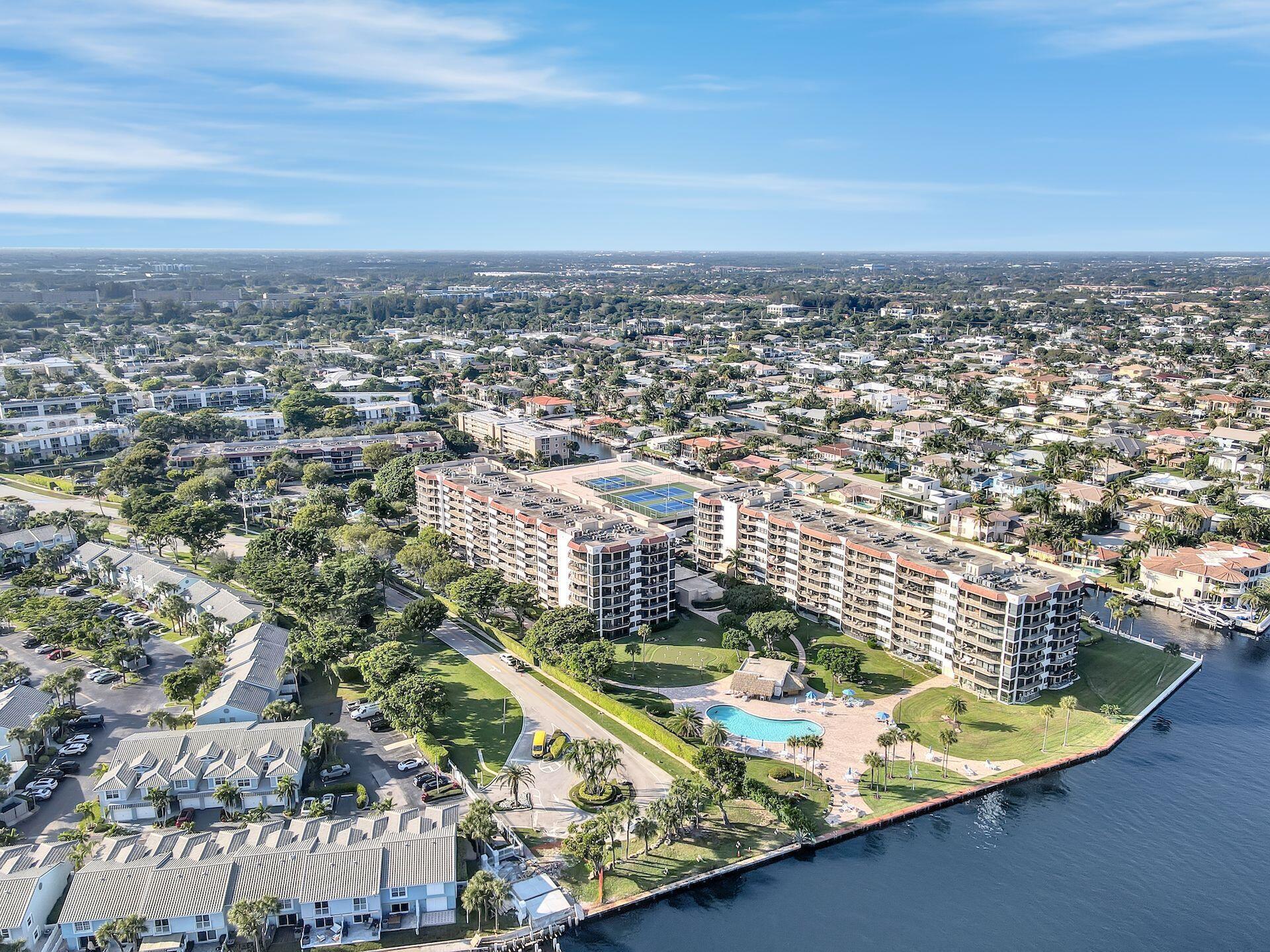 859 Jeffery Street, Unit 506 Boca Raton, FL 33487 - Photo 63 of 80 an aerial view of residential houses with outdoor space