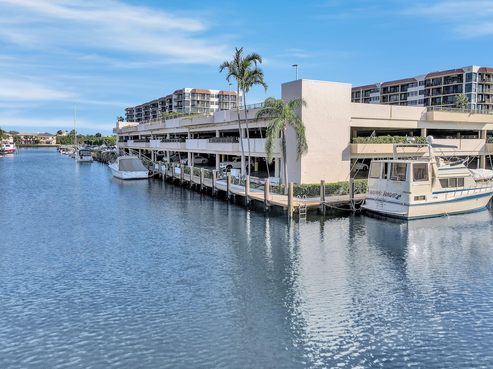 859 Jeffery Street, Unit 506 Boca Raton, FL 33487 - Photo 66 of 80 a view of a lake with building in front of house