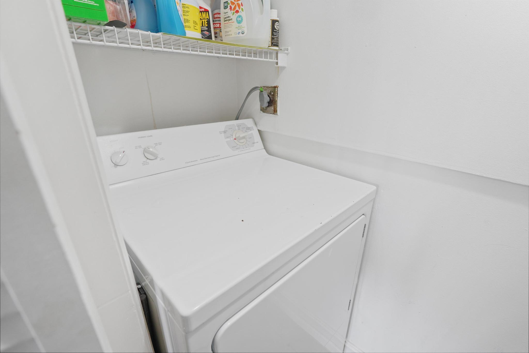 859 Jeffery Street, Unit 506 Boca Raton, FL 33487 - Photo 79 of 80 a utility room with dryer and washer