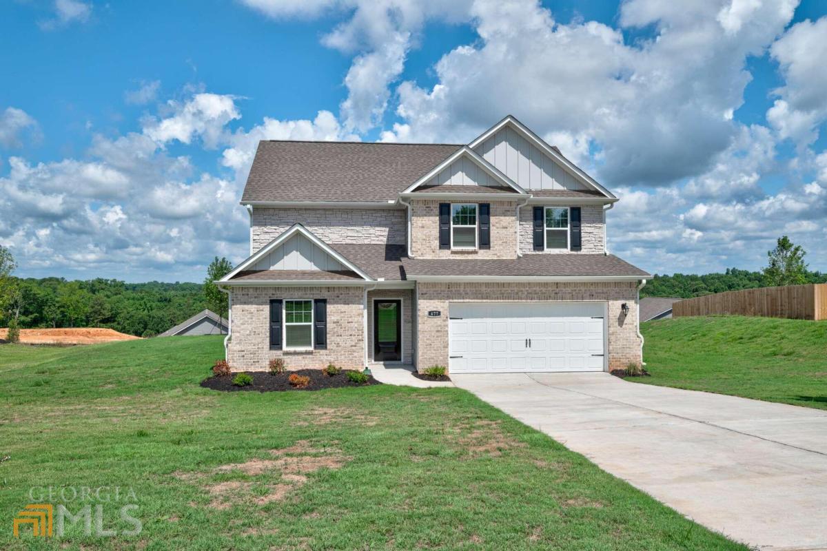 489 Samara Court Fairburn, GA 30213 - Photo 1 of 1 a front view of a house with a yard and garage