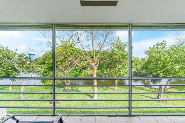 a view of a yard and a lake view