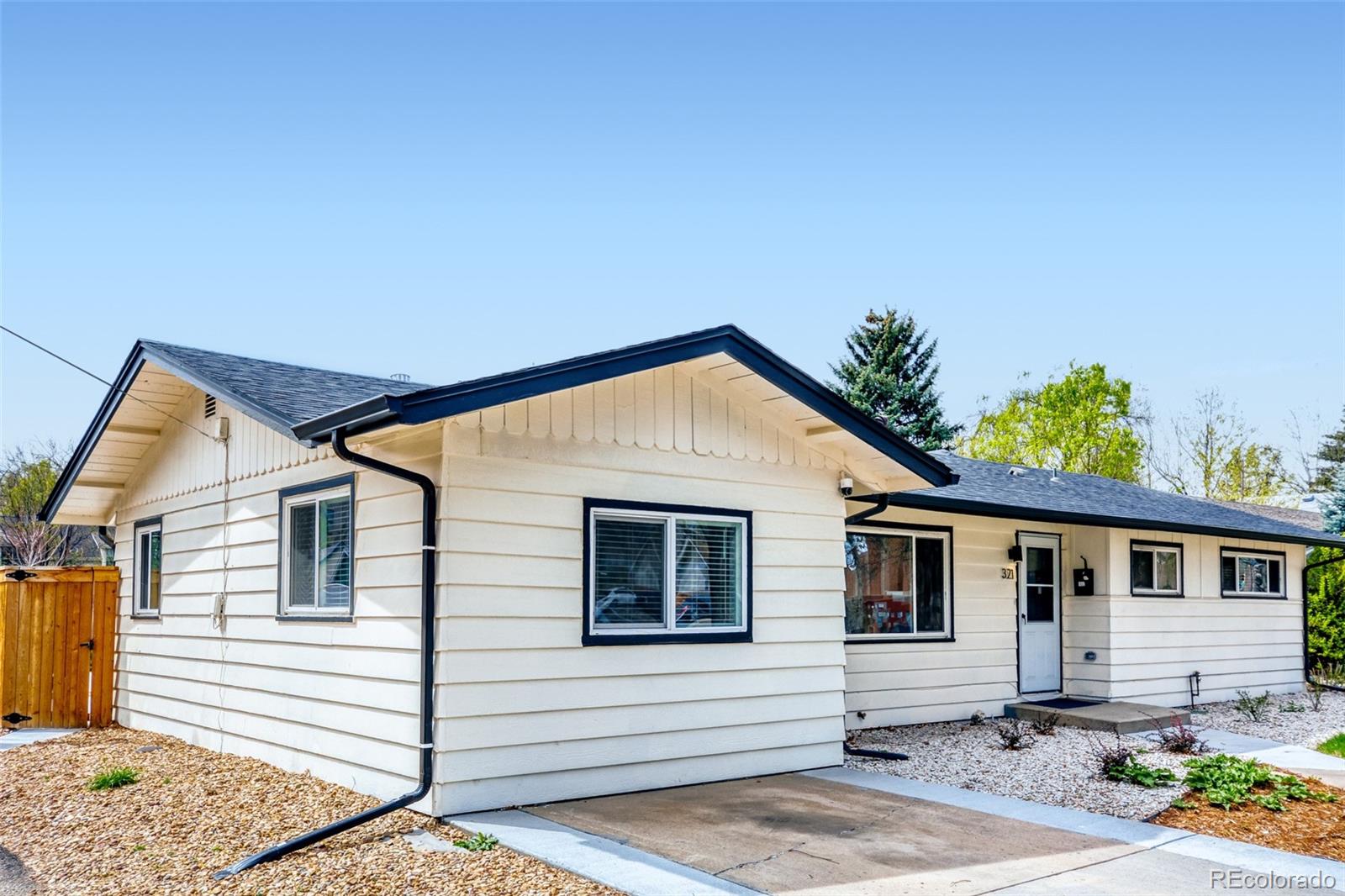 321 West Mulberry Street Fort Collins, CO 80521 - Photo 2 of 32 a view of house that has a car park