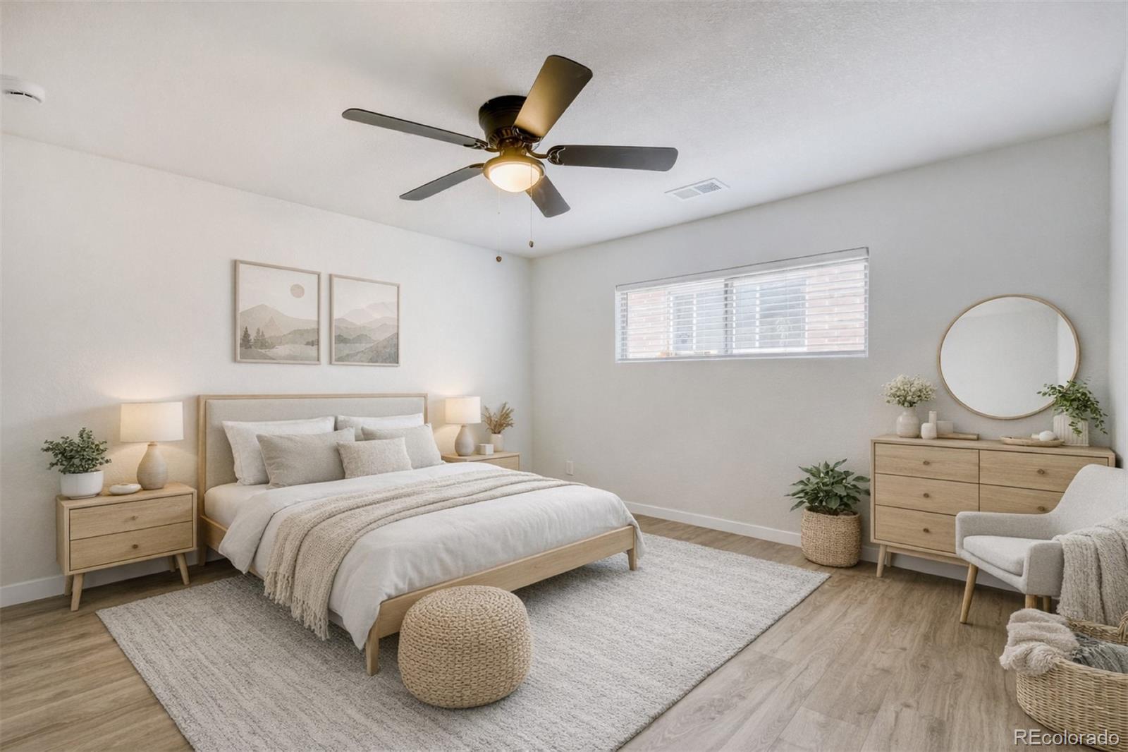 321 West Mulberry Street Fort Collins, CO 80521 - Photo 24 of 32 a bedroom with a bed and a chandelier