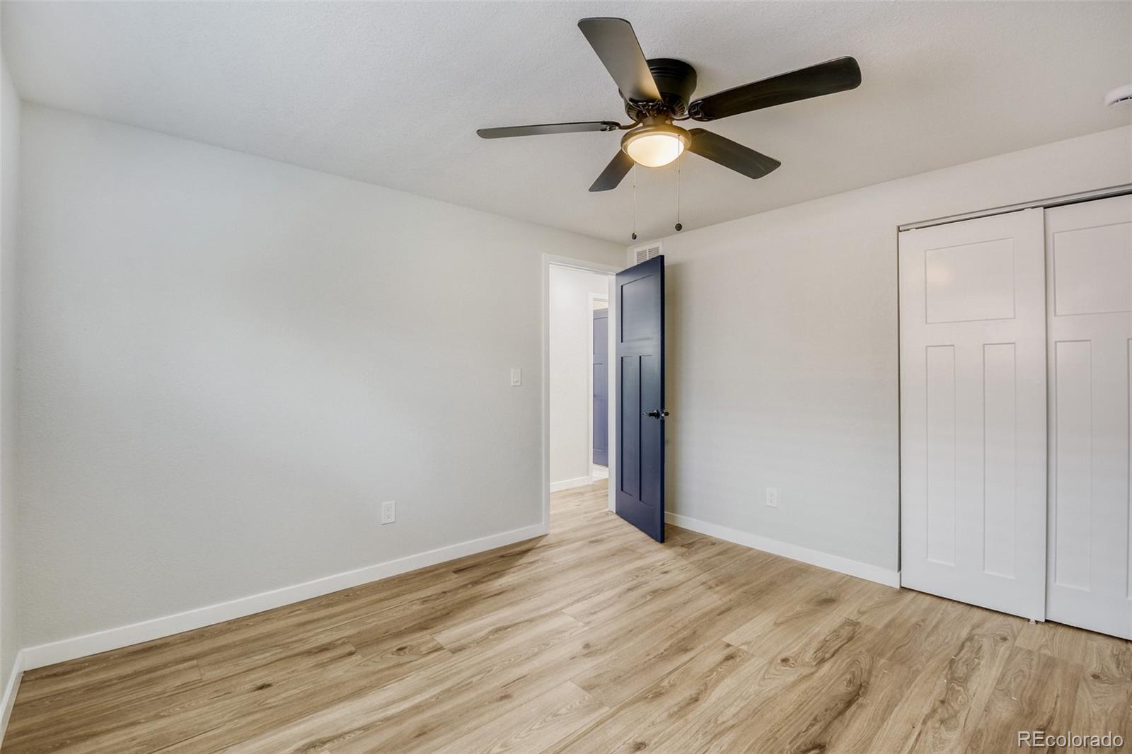 321 West Mulberry Street Fort Collins, CO 80521 - Photo 26 of 32 wooden floor in an empty room