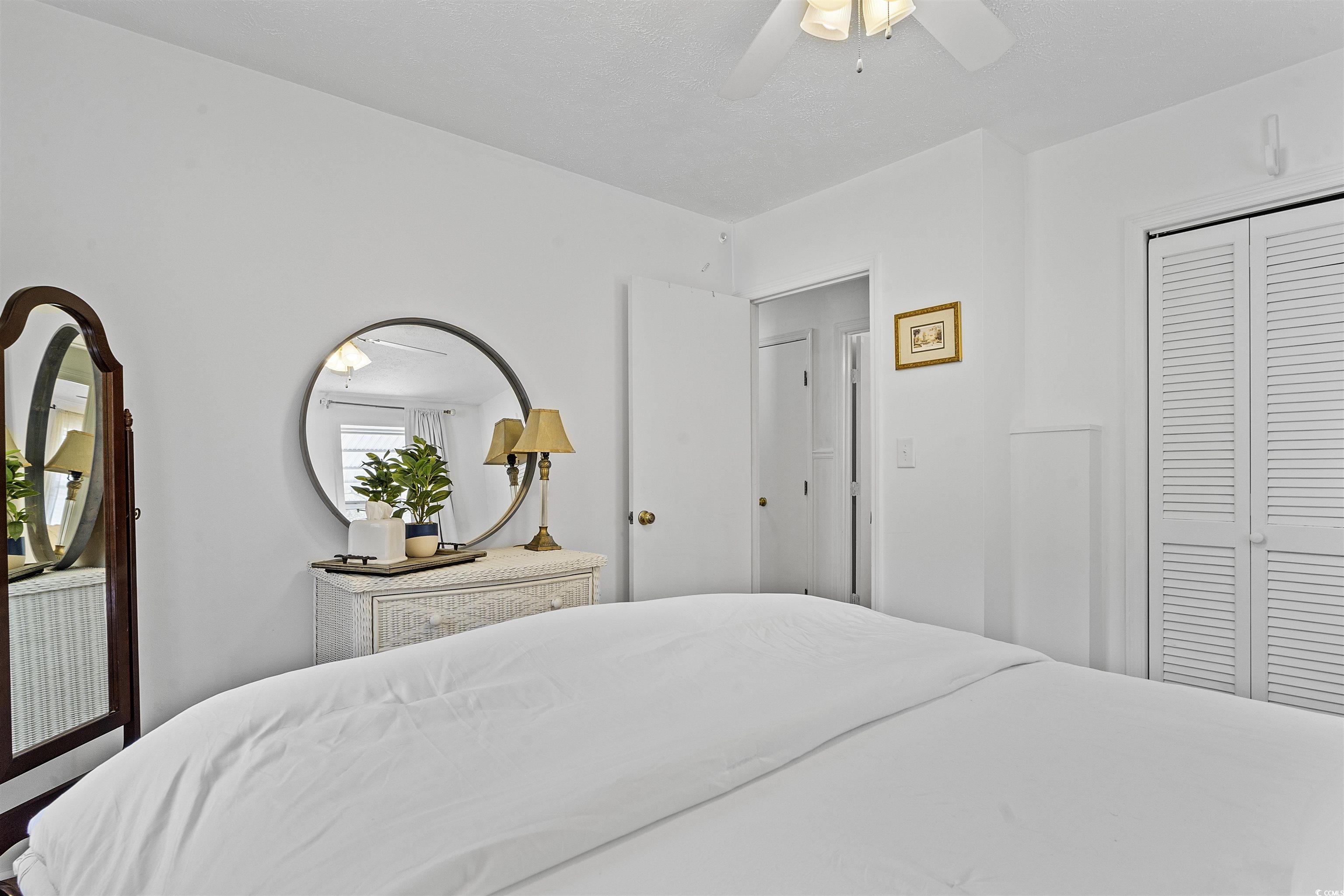 300 Goretown Loop Loris, SC 29569 - Photo 23 of 37 Bedroom featuring a closet and ceiling fan