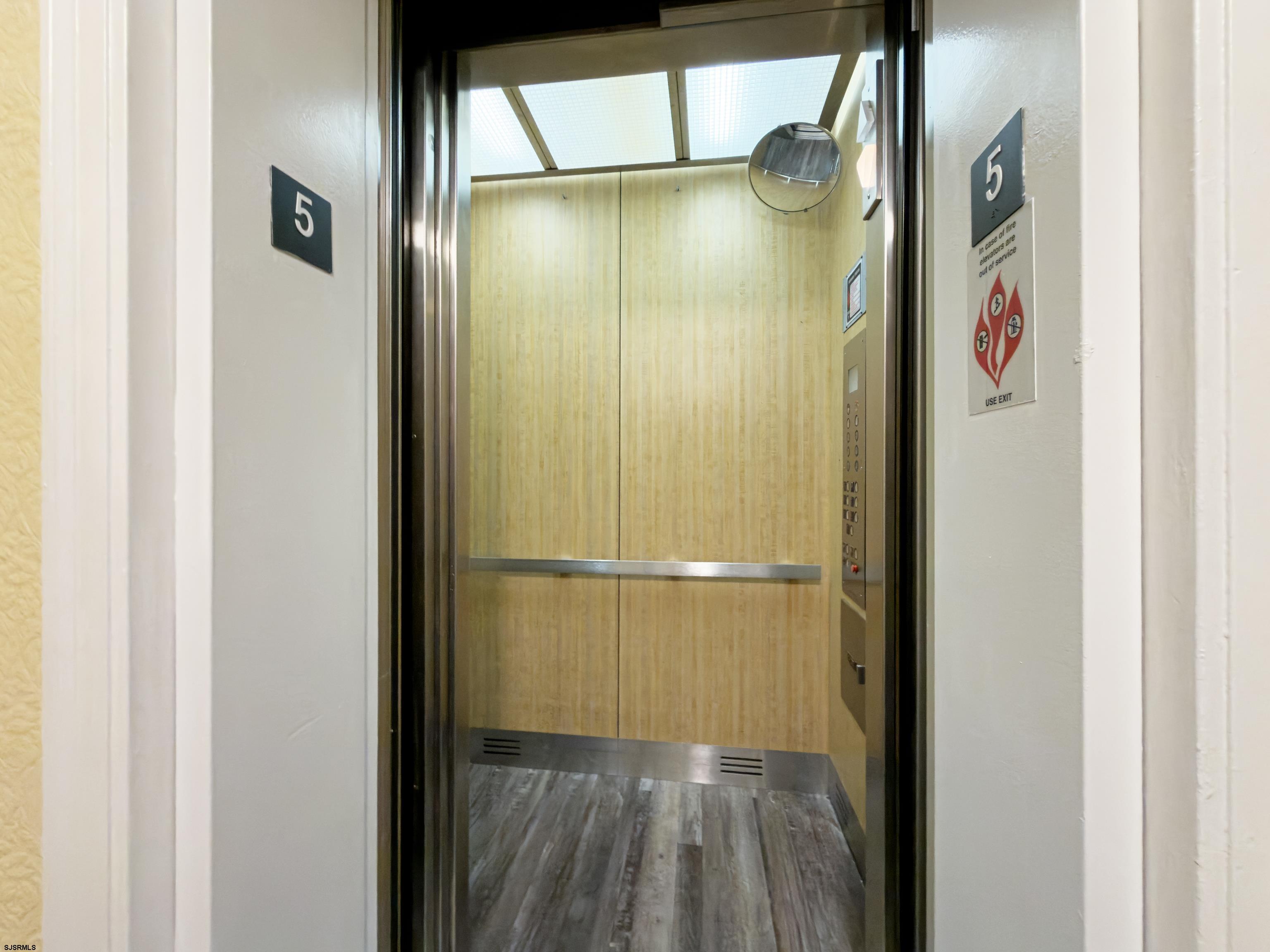 807 East 8th Street, Unit 515 Ocean City, NJ 08226 - Photo 19 of 34 a bathroom with a glass shower door
