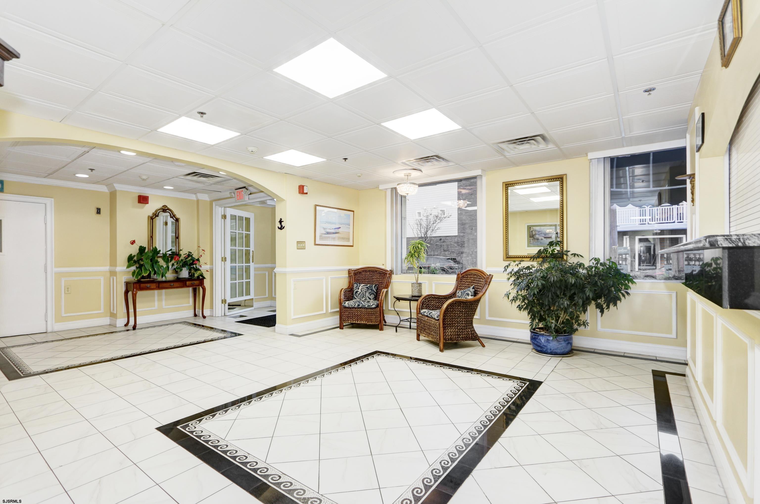 807 East 8th Street, Unit 515 Ocean City, NJ 08226 - Photo 20 of 34 a living room with furniture