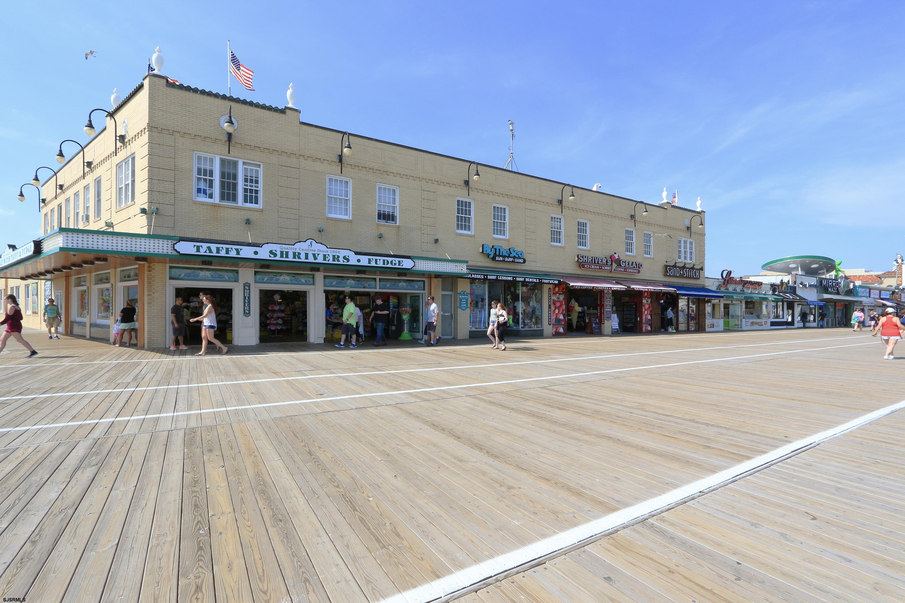 807 East 8th Street, Unit 515 Ocean City, NJ 08226 - Photo 32 of 34 a front view of a building with a lots of traffic