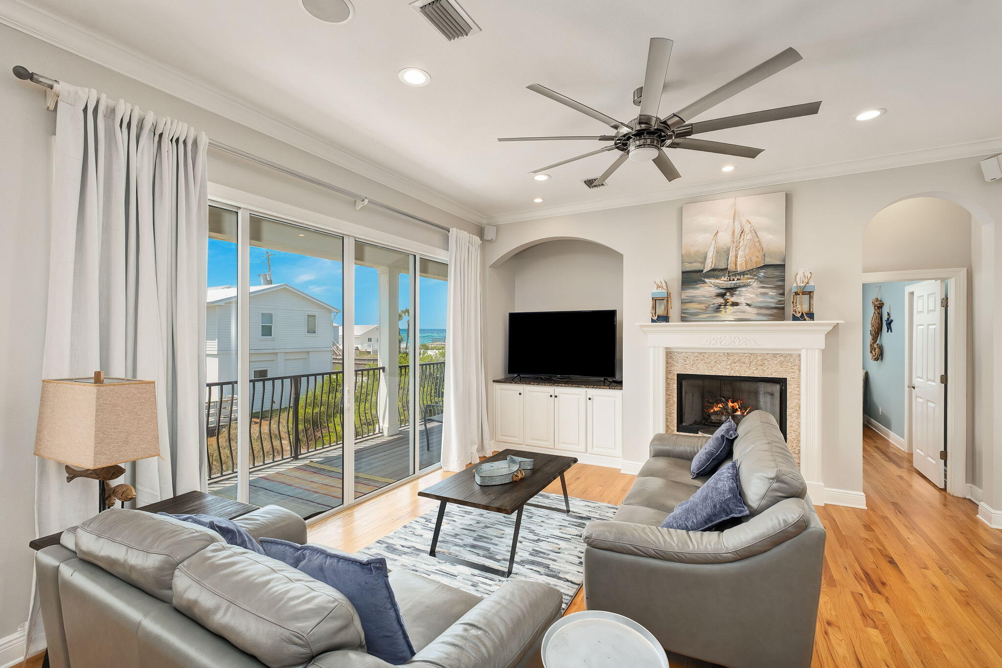 226 Sandtrap Road Miramar Beach, FL 32550 - Photo 10 of 15 a living room with furniture a fireplace and a flat screen tv