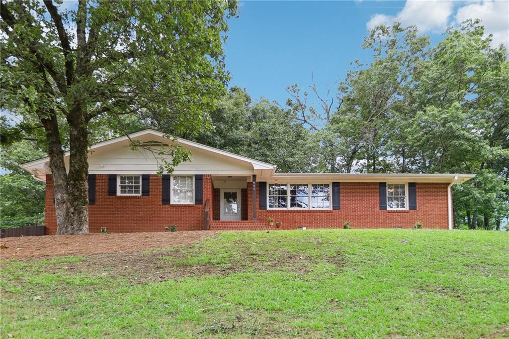 665 Chulio Road Southeast Rome, GA 30161 - Photo 1 of 1 front view of a house with a yard