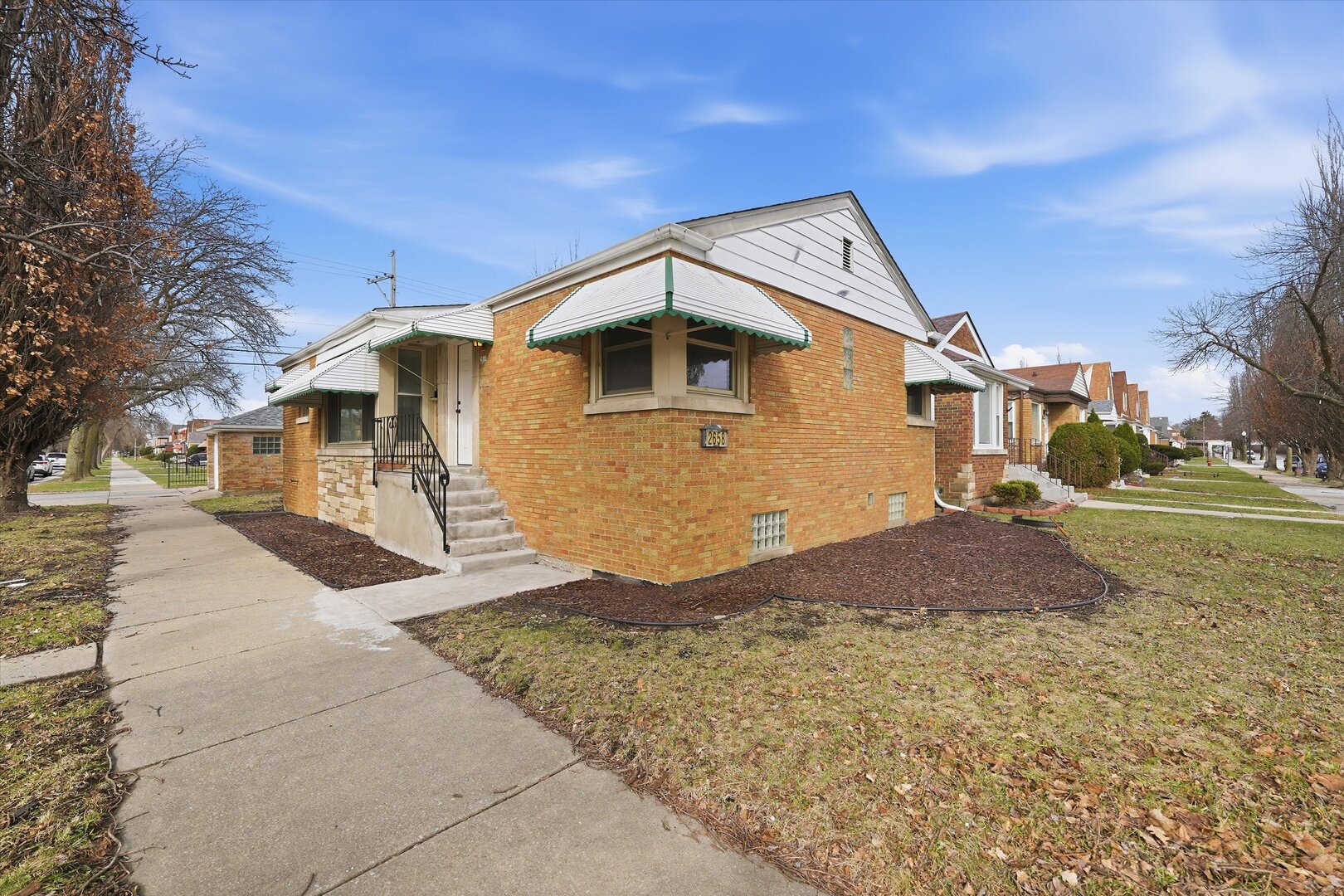 2658 West 83rd Street Chicago, IL 60652 - Photo 1 of 37 a front view of a house with a yard