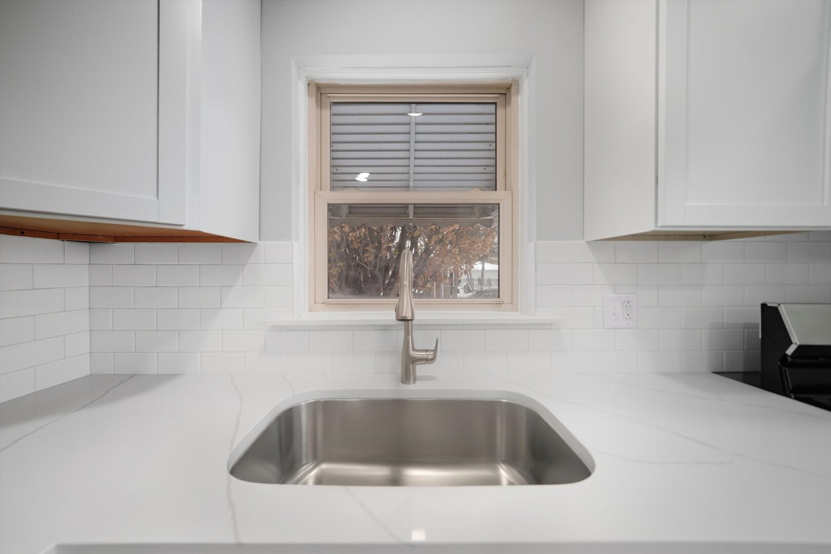 2658 West 83rd Street Chicago, IL 60652 - Photo 11 of 37 a bathroom with a sink and mirror