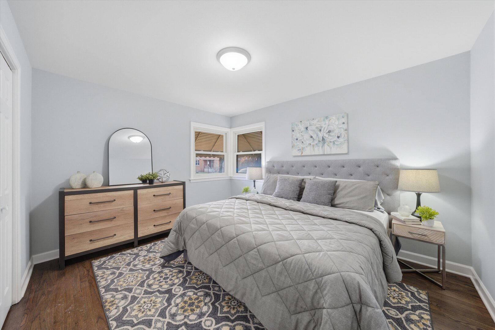 2658 West 83rd Street Chicago, IL 60652 - Photo 17 of 37 a bedroom with a bed and a dresser