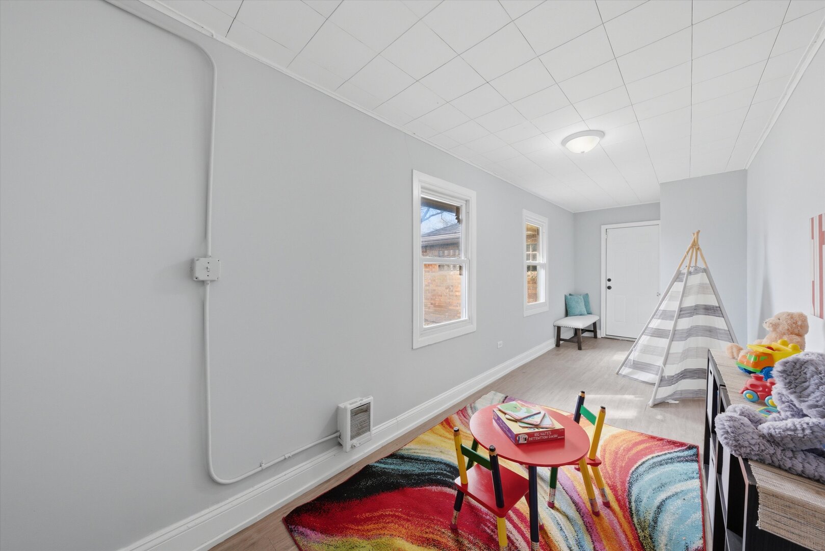 2658 West 83rd Street Chicago, IL 60652 - Photo 24 of 37 a bedroom with a bed and a table in it