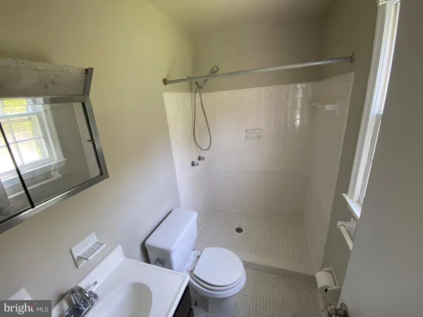 an empty room with closet area