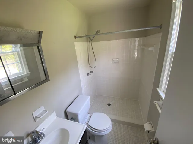 an empty room with closet area