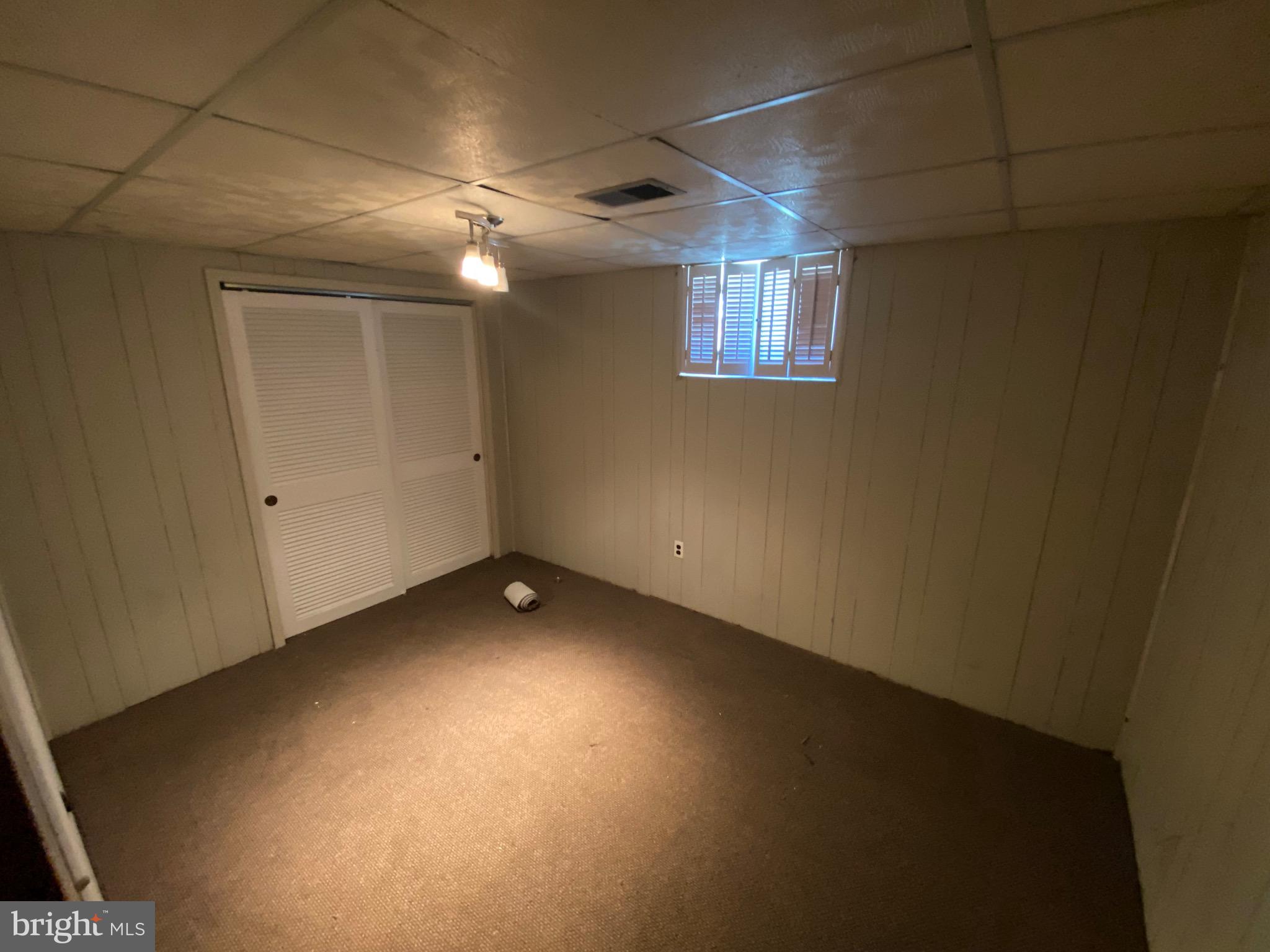 11711 Butlers Branch Road Clinton, MD 20735 - Photo 20 of 23 a view of an empty room with a window