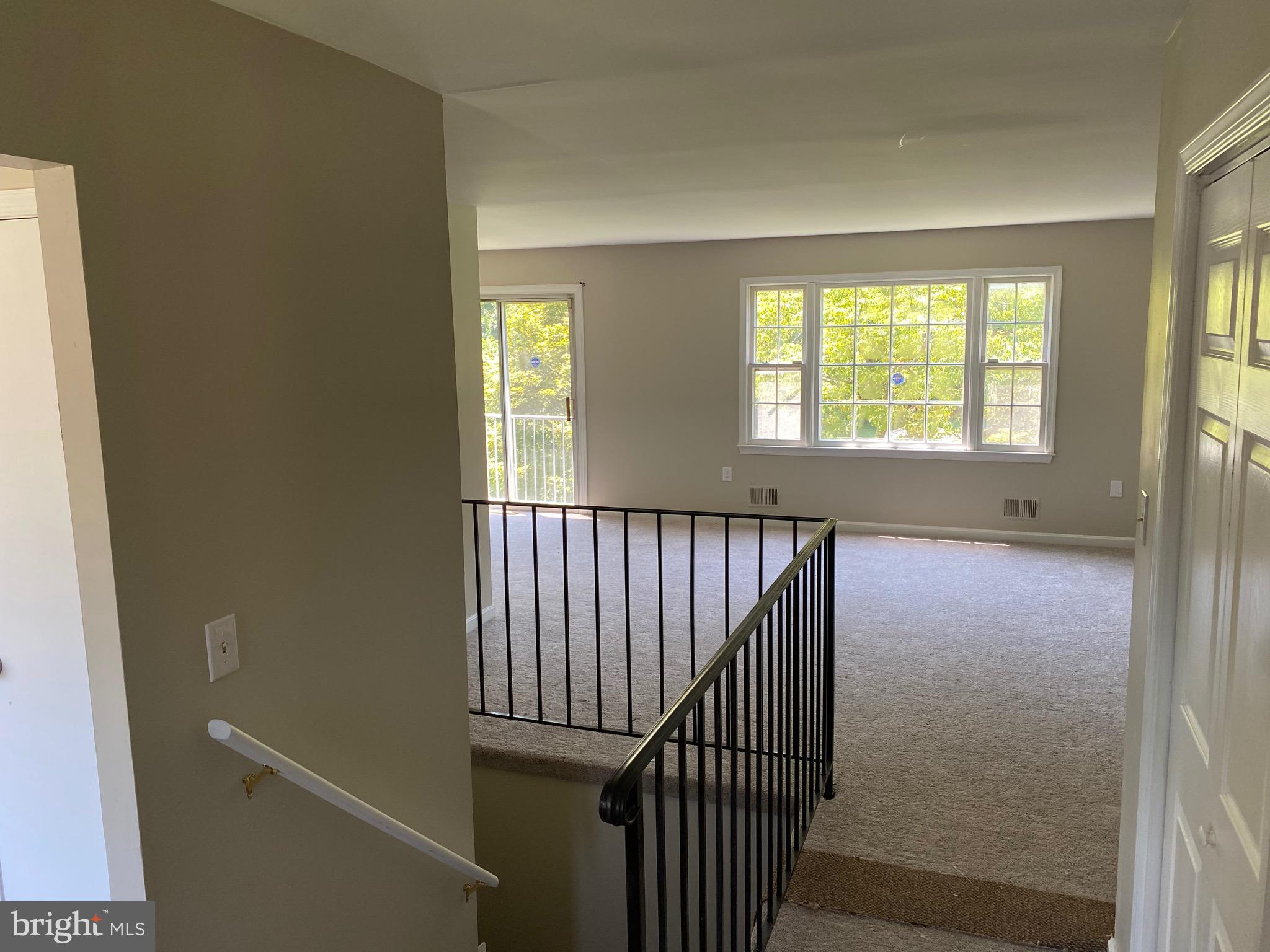 11711 Butlers Branch Road Clinton, MD 20735 - Photo 2 of 23 a view of hallway with windows