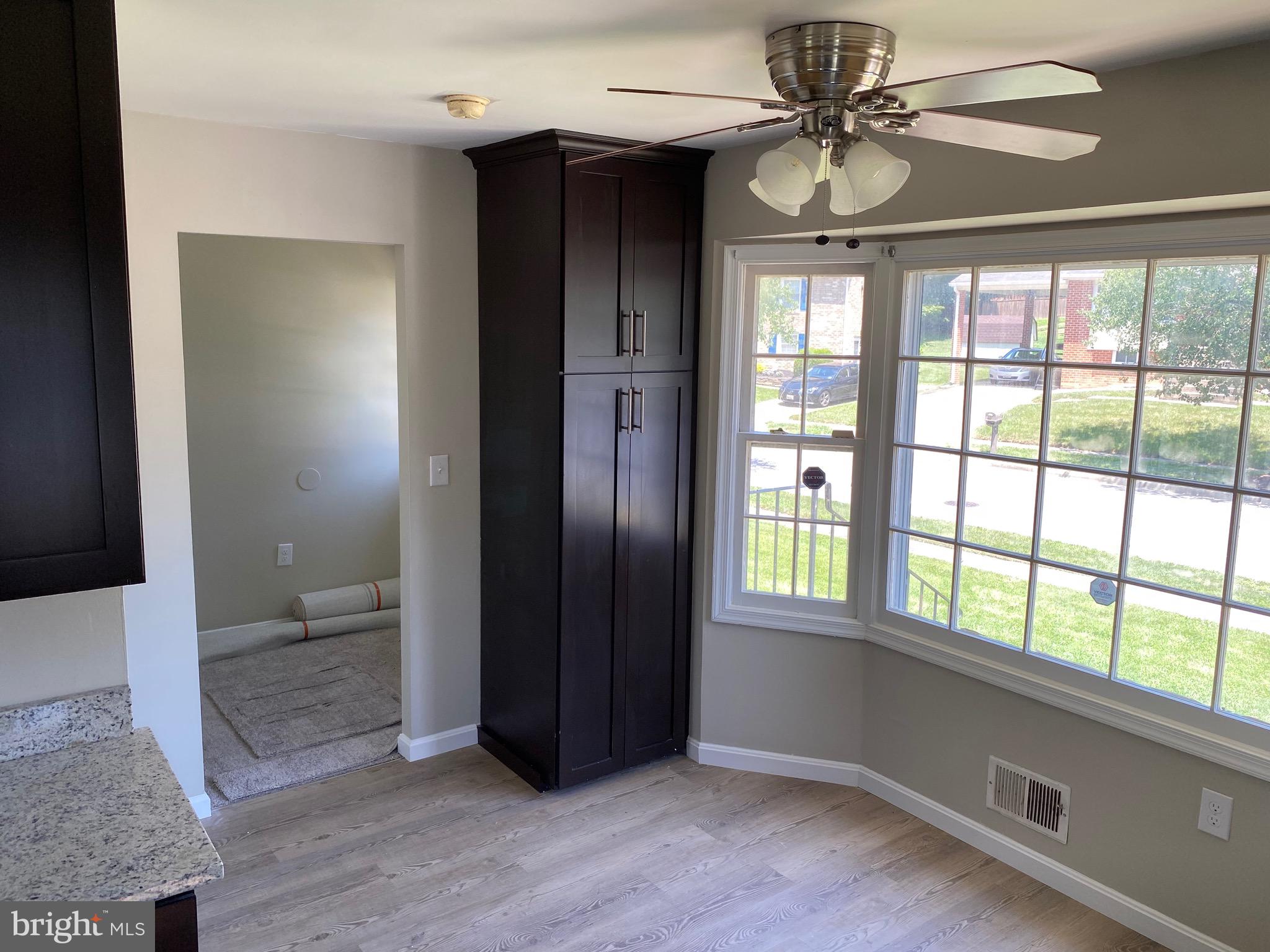 11711 Butlers Branch Road Clinton, MD 20735 - Photo 5 of 23 a view of an empty room with a window