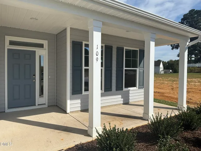 a view of a entryway door front of house