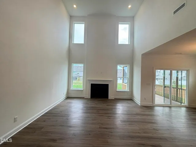 a kitchen with granite countertop a stove and a sink