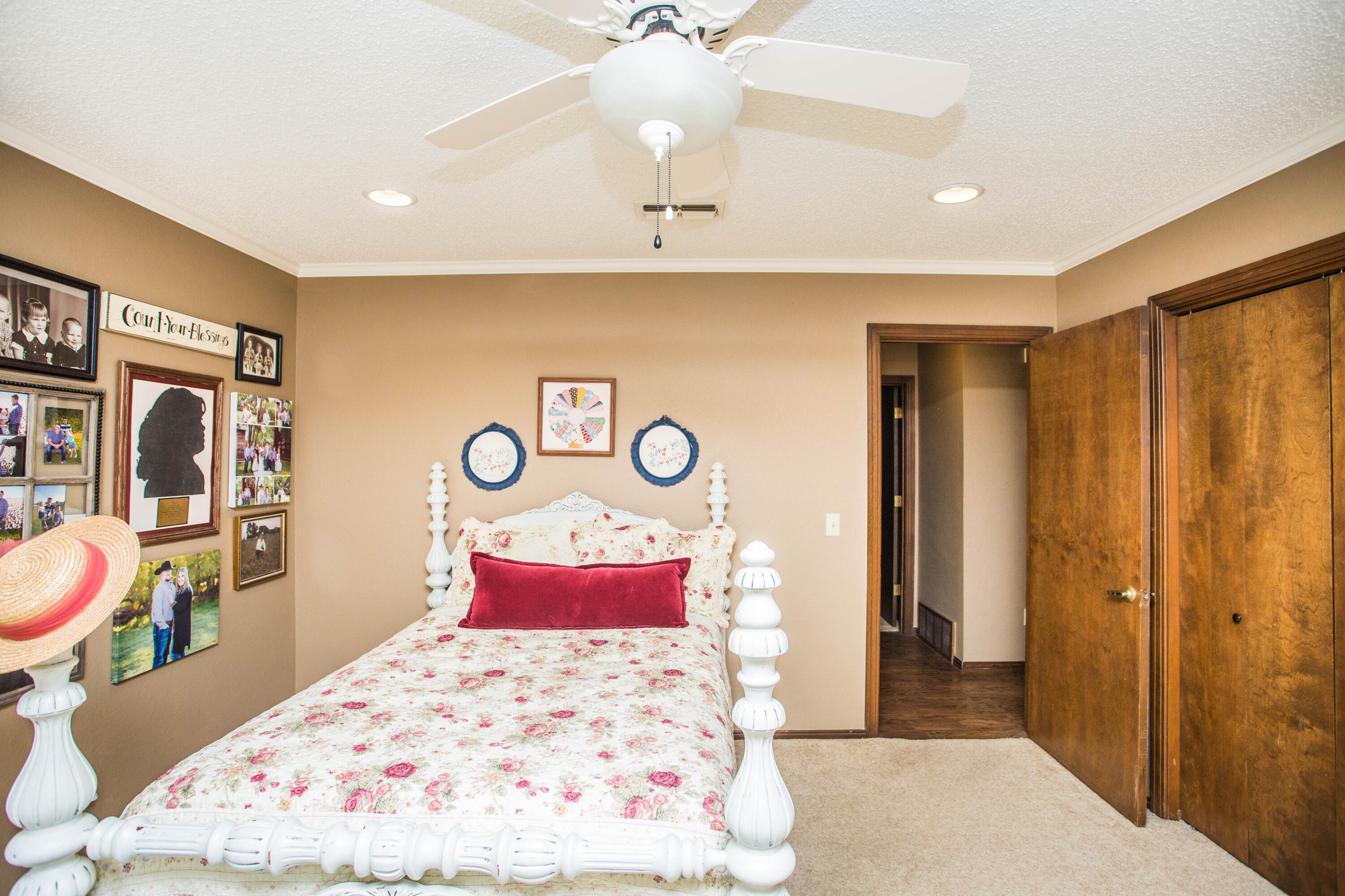 1304 Jefferson Drive Plainview, TX 79072 - Photo 26 of 50 a bed room with a bed mirror and a table