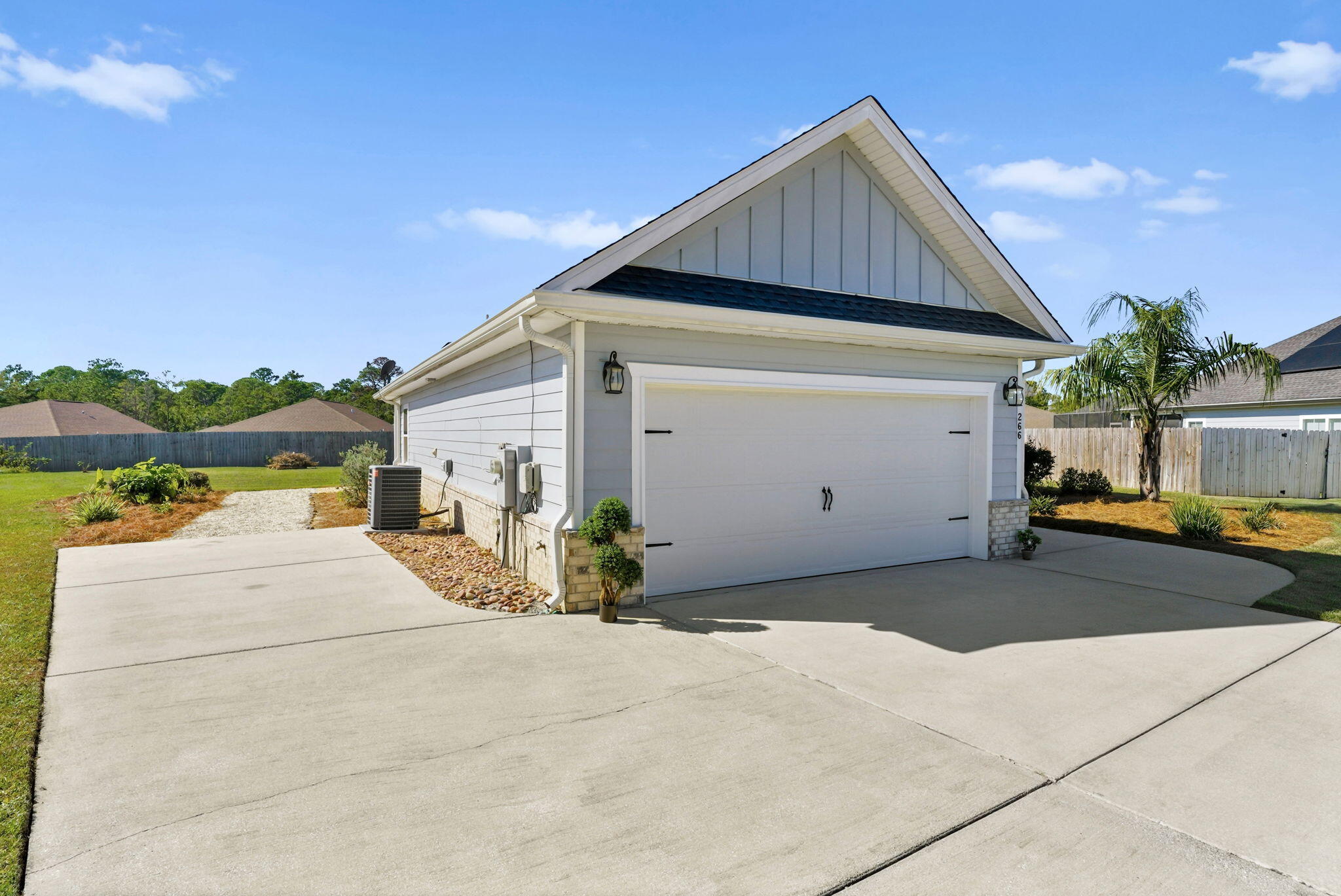 266 Partridge Lane Freeport, FL 32439 - Photo 2 of 36 a view of a house with backyard