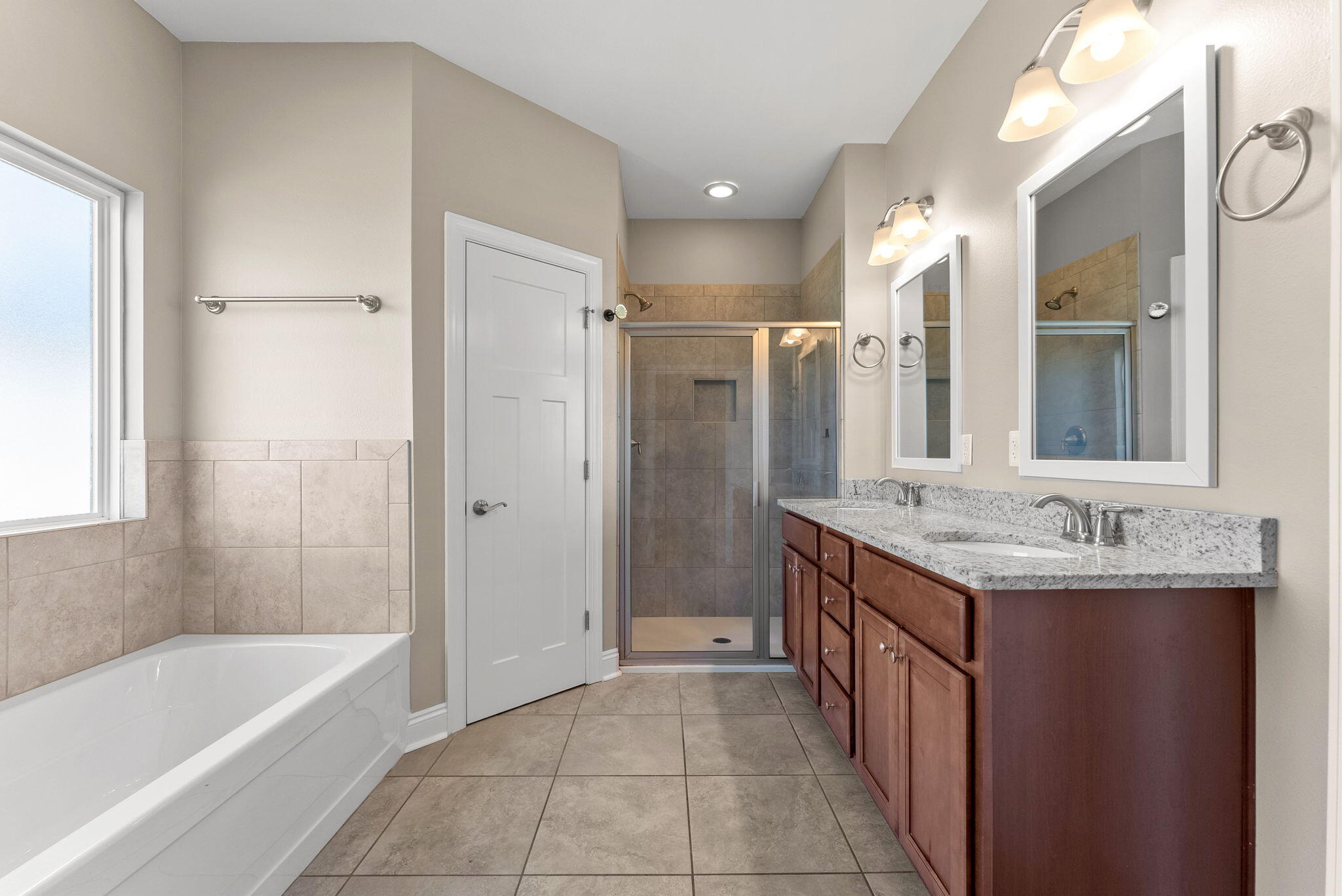 266 Partridge Lane Freeport, FL 32439 - Photo 21 of 36 a bathroom with a tub sink shower and mirror