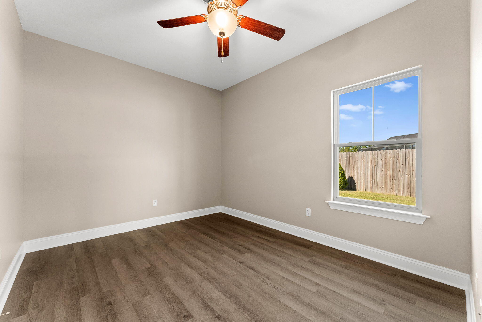 266 Partridge Lane Freeport, FL 32439 - Photo 26 of 36 an empty room with a window