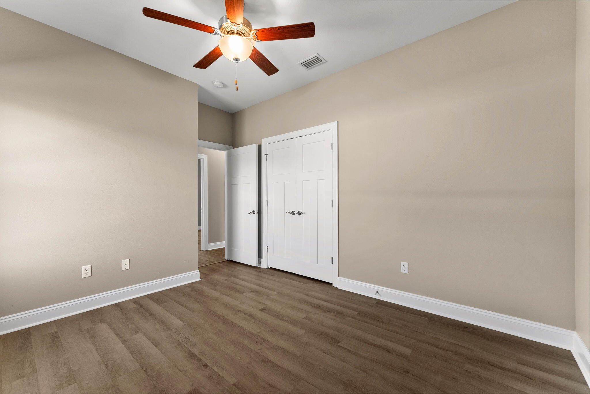 266 Partridge Lane Freeport, FL 32439 - Photo 27 of 36 wooden floor in an empty room