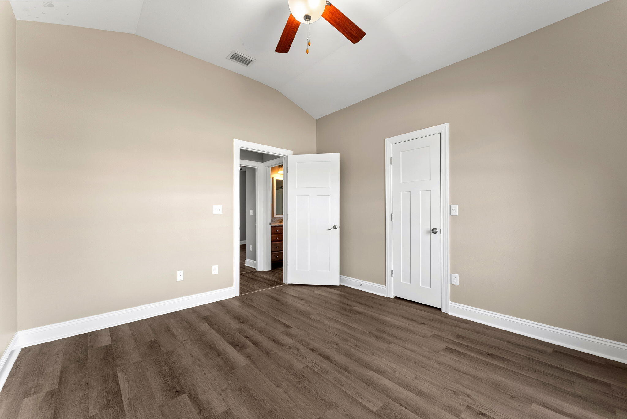 266 Partridge Lane Freeport, FL 32439 - Photo 29 of 36 a view of an empty room with wooden floor