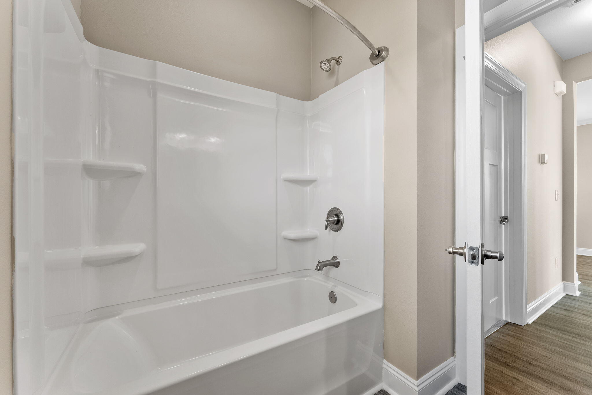 266 Partridge Lane Freeport, FL 32439 - Photo 31 of 36 a bathroom with a bathtub and a shower