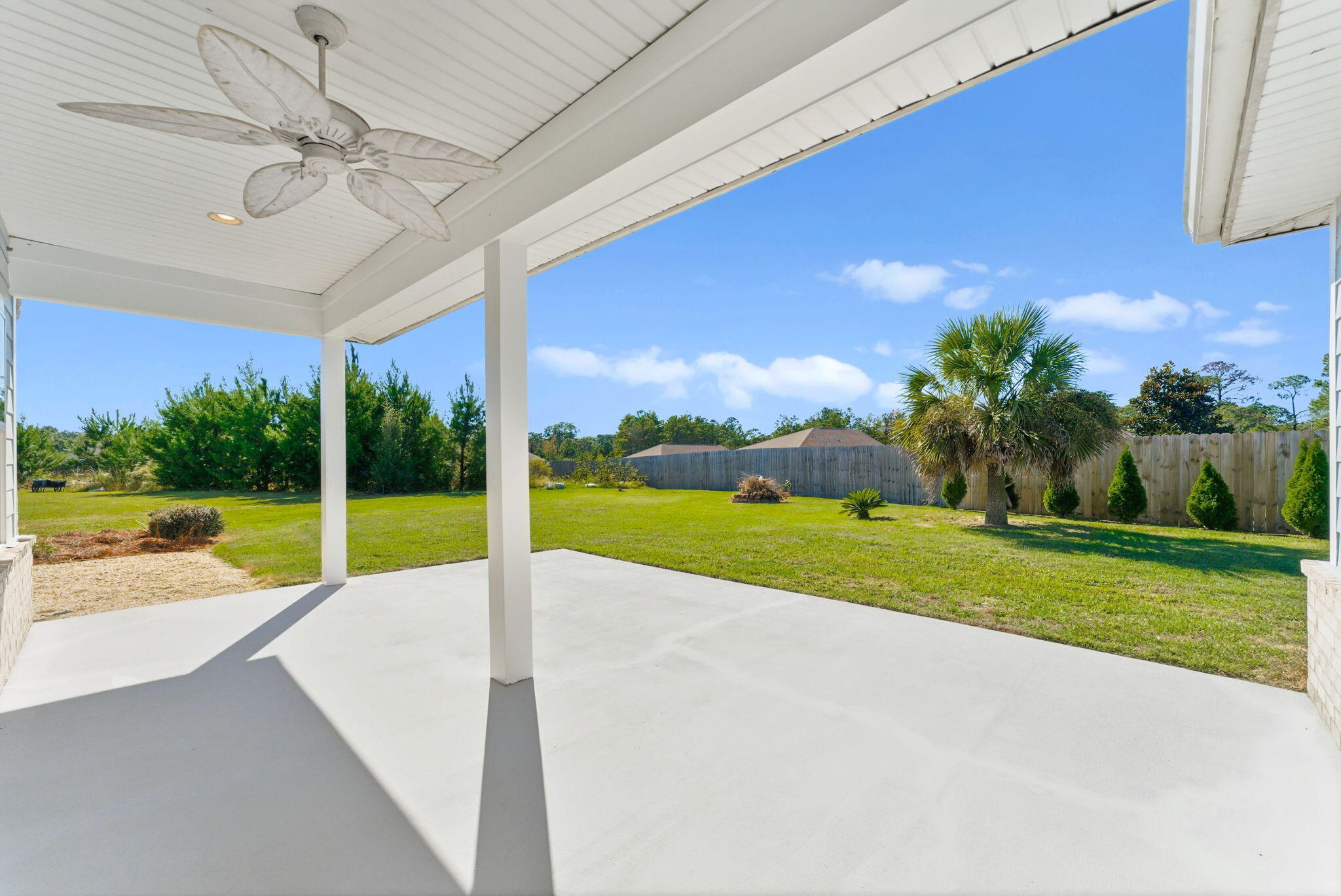 266 Partridge Lane Freeport, FL 32439 - Photo 32 of 36 a view of a house with a swimming pool